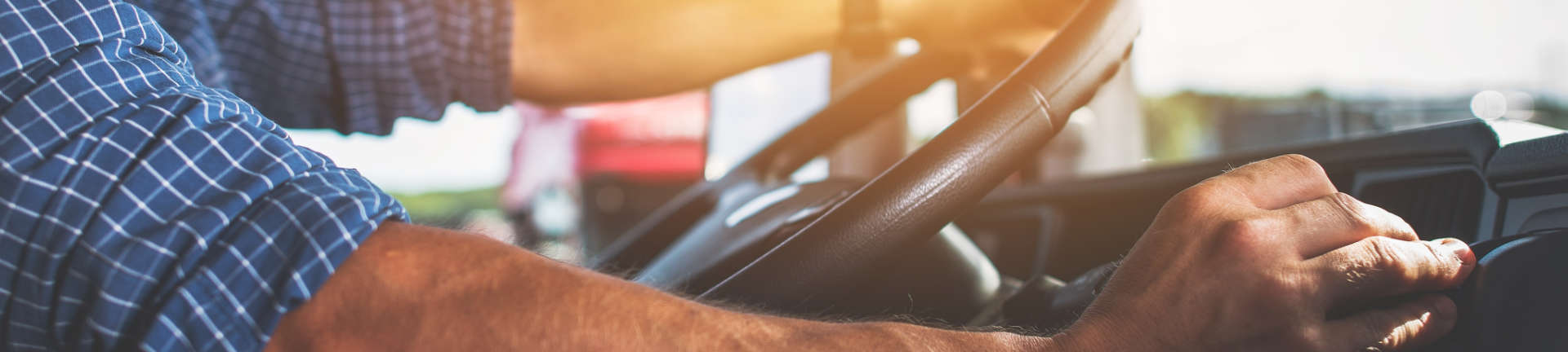 a man driving a vehicle