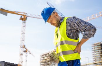 Engineer With Back Pain Injury After Accident At Construction Site